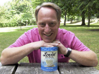 Lovin’ Scoopful co-founder Dan Samson is all smiles as the ice-cream company he founded with Tim Shriver