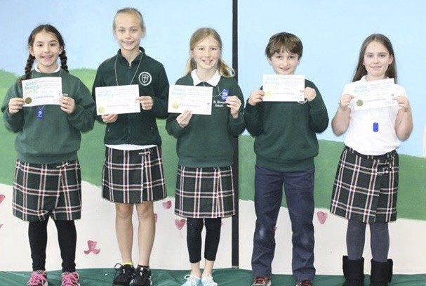 St. Monica School’s Global Reading Challenge team won the local district challenge on Feb. 24 at the Mercer Island Library (Contributed photo).