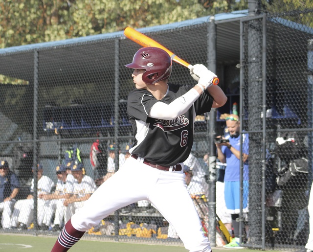 Mercer Island’s Greg Fuchs steps up to bat against Bellevue Friday at Bellevue High School. Fuchs went 2-for-3 with 2 RBI as the Islanders beat the Wolverines 5-0 (Joe Livarchik/staff photo).