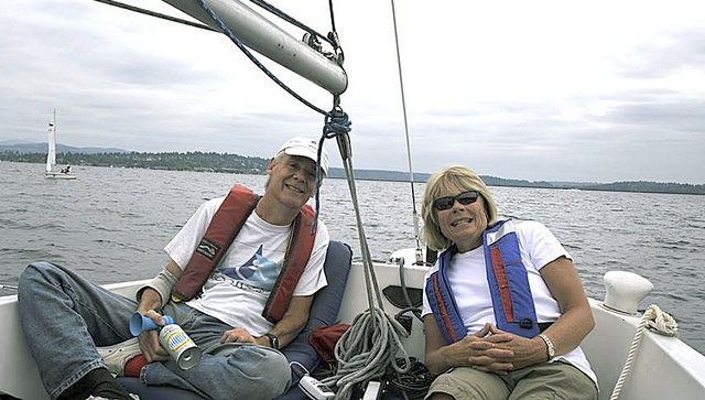 Footloose Sailing Association founder Bob Ewing (left) enjoys a day on Lake Washington with Sue Stow. This year
