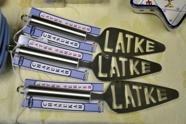 These latke servers are for sale at the Herzl-Ner Tamid Judaica Shop.