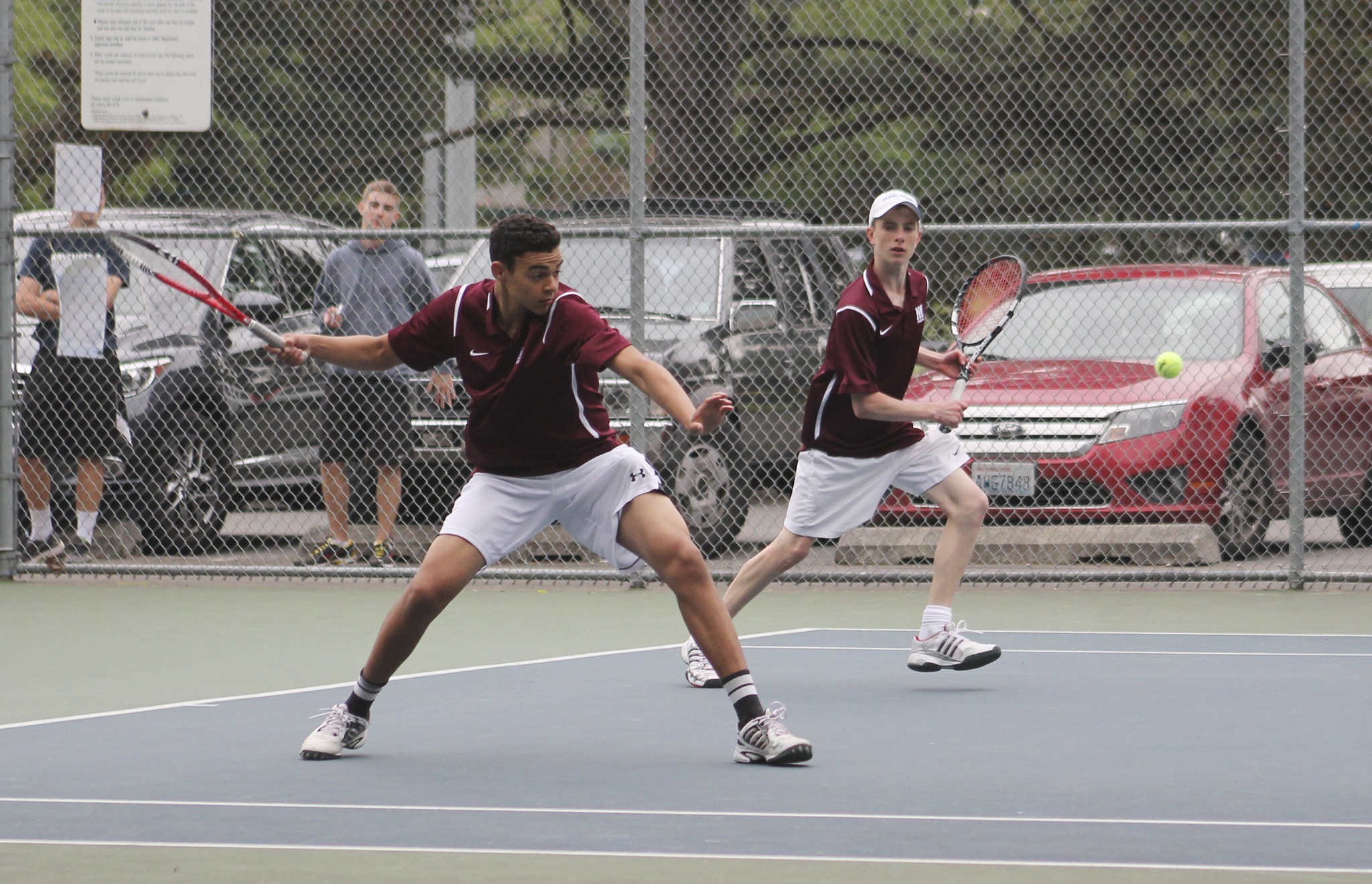 Christian Anderson (left) and Chris Elliott survived Garfield’s Oscar Burney and Brad Huffaker in three sets 6-4