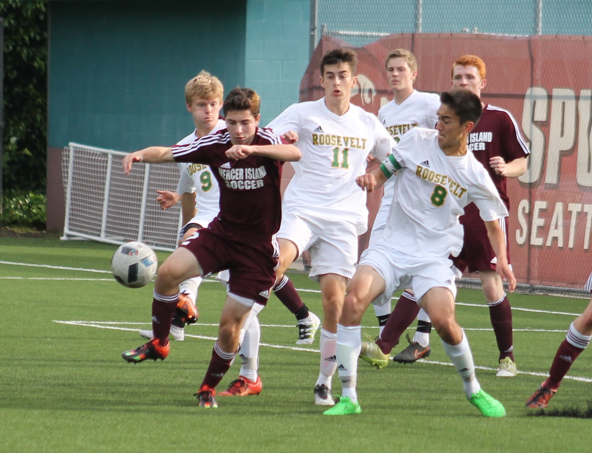 Mercer Island’s Mitchell Meade fights for possession after a corner kick during the Islanders’ 3A state quarterfinal matchup against Roosevelt Friday at Interbay Soccer Stadium in Seattle. Meade scored a goal in the Islanders’ 2-1 win over the Rough Riders (Joe Livarchik/staff photo).