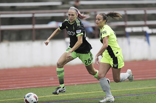 Sounders Women defender Stephanie Spierkman pushes a possession up the field against the Portland Spartans June 11 at Islander Stadium. Mercer Island FC hosted the soccer match (Photo courtesy of Garth and Molly Fort).