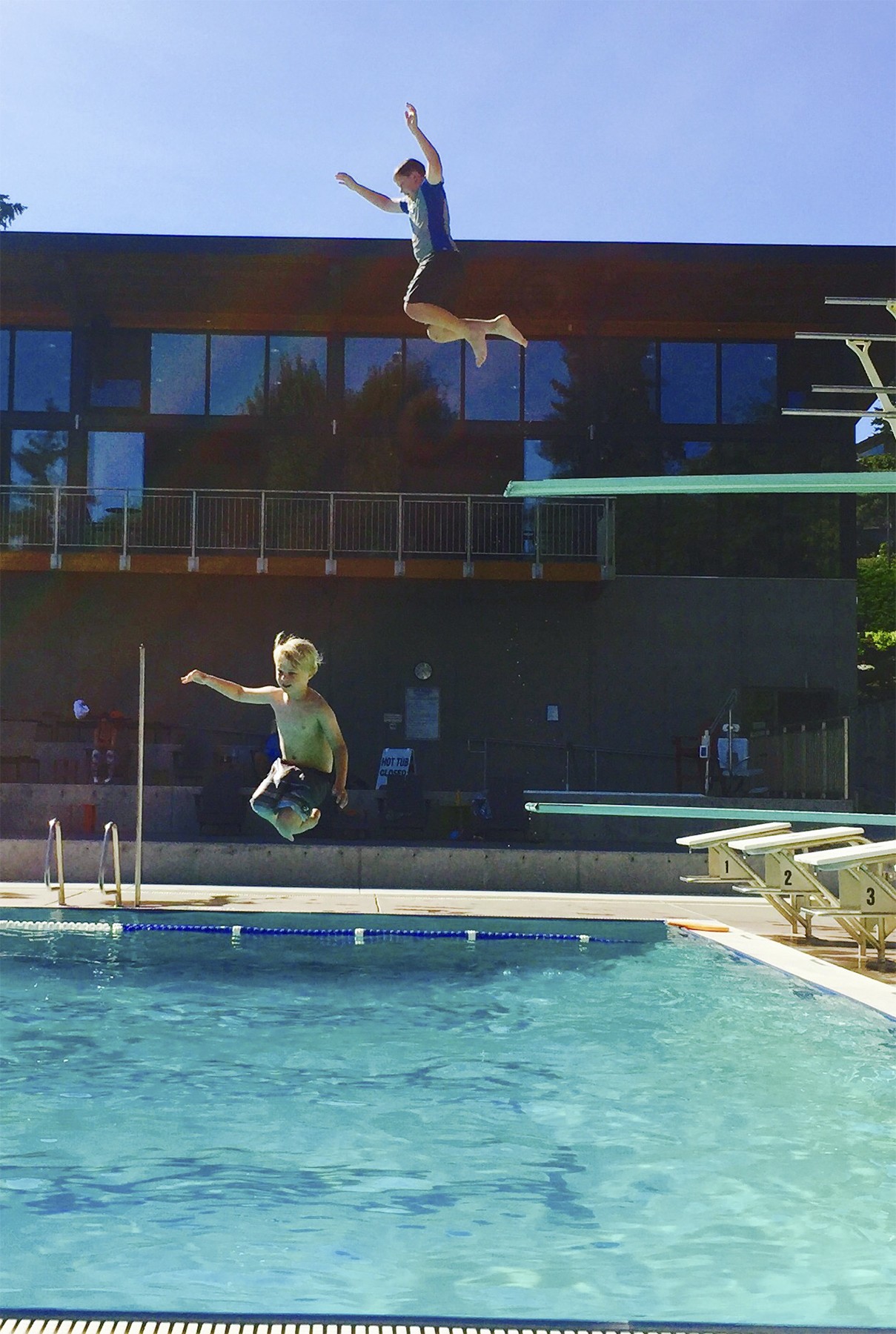 Nicholas Keefe and Evan Otte enjoy one of the last days of summer at Mercerwood Shore Club. Photo courtesy of Julie Keefe.