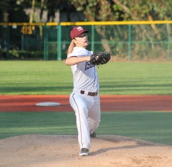 Will Mansfield delivers a first-inning pitch against Bellevue Wednesday night at Island Crest Park. Mercer Island fell to the Wolverines