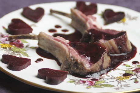 A rack of lamb with a cherry and port wine sauce makes for a lightly sweet