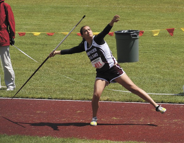 Mercer Island's Carly Andersen tosses the javelin during the 3A state tournament in Tacoma last Friday afternoon.