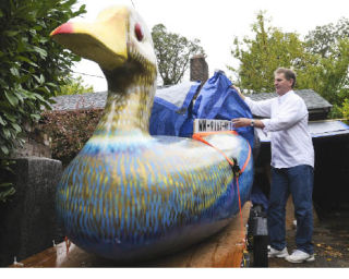 Islander Kevin Curry uncovers his homemade art boat