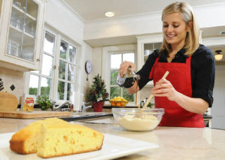 Islander Missy Firnstahl adds syrup to Von’s deep dish maple butter cornbread.