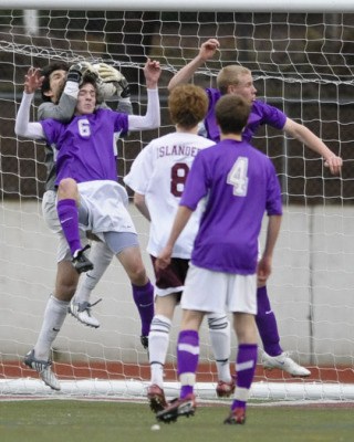 Islander senior goalkeeper Forrest Marowitz makes a save against Lake Washington during a preseason game.