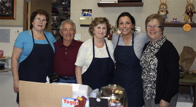 Longtime employees of Alpenland Delicatessen and Restaurant will miss the family they’ve created over the years. From left are Helga Pelroy