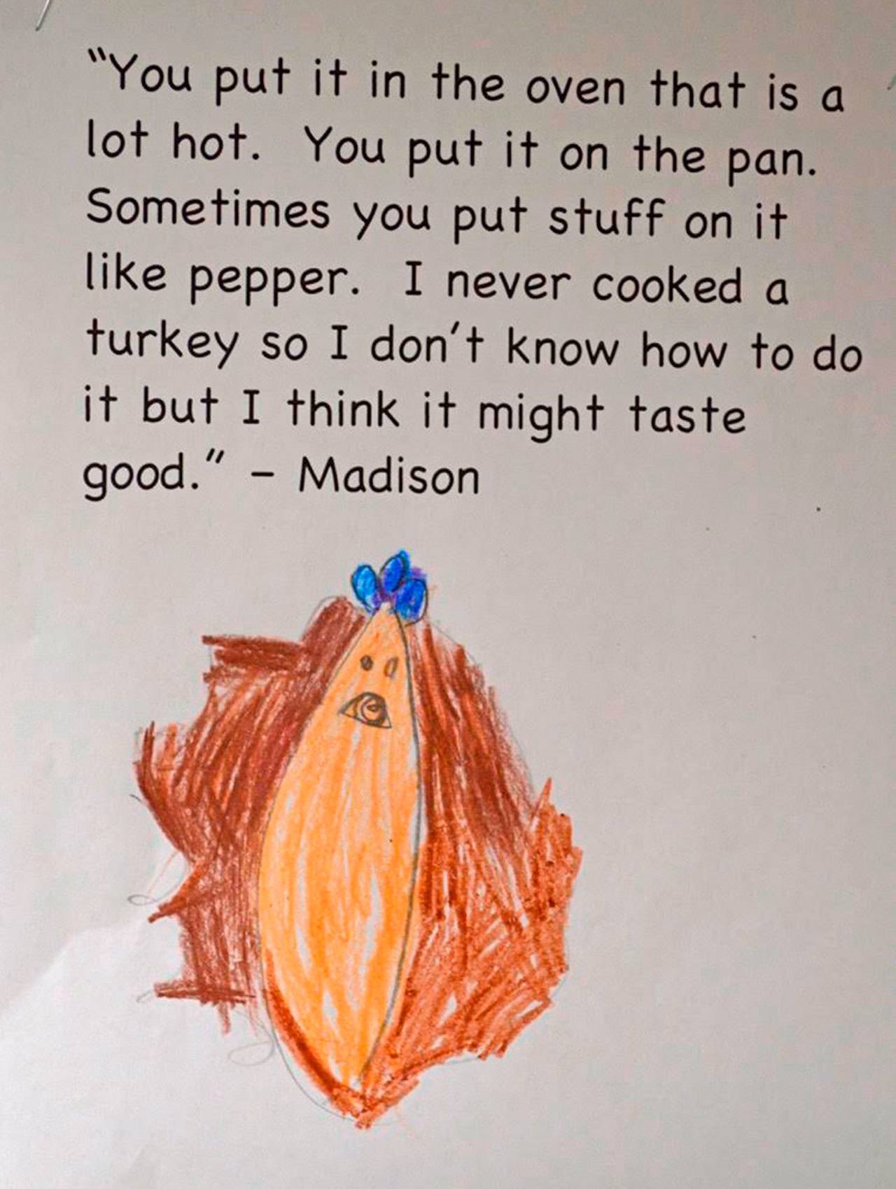 Madison, a kindergartener at Lakeridge Elementary in Mercer Island, answers her teacher Joby McGowan’s question: how do you cook a Thanksgiving turkey? Photos courtesy of Craig Degginger