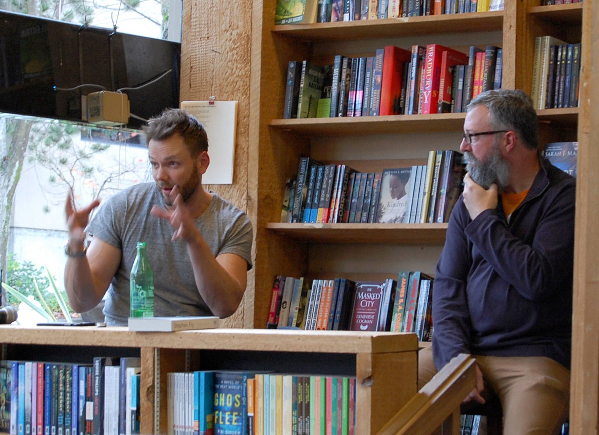 Joel McHale discusses his book, growing up on the Island and other topics with James Crossley at Island Books. Katie Metzger/staff photo