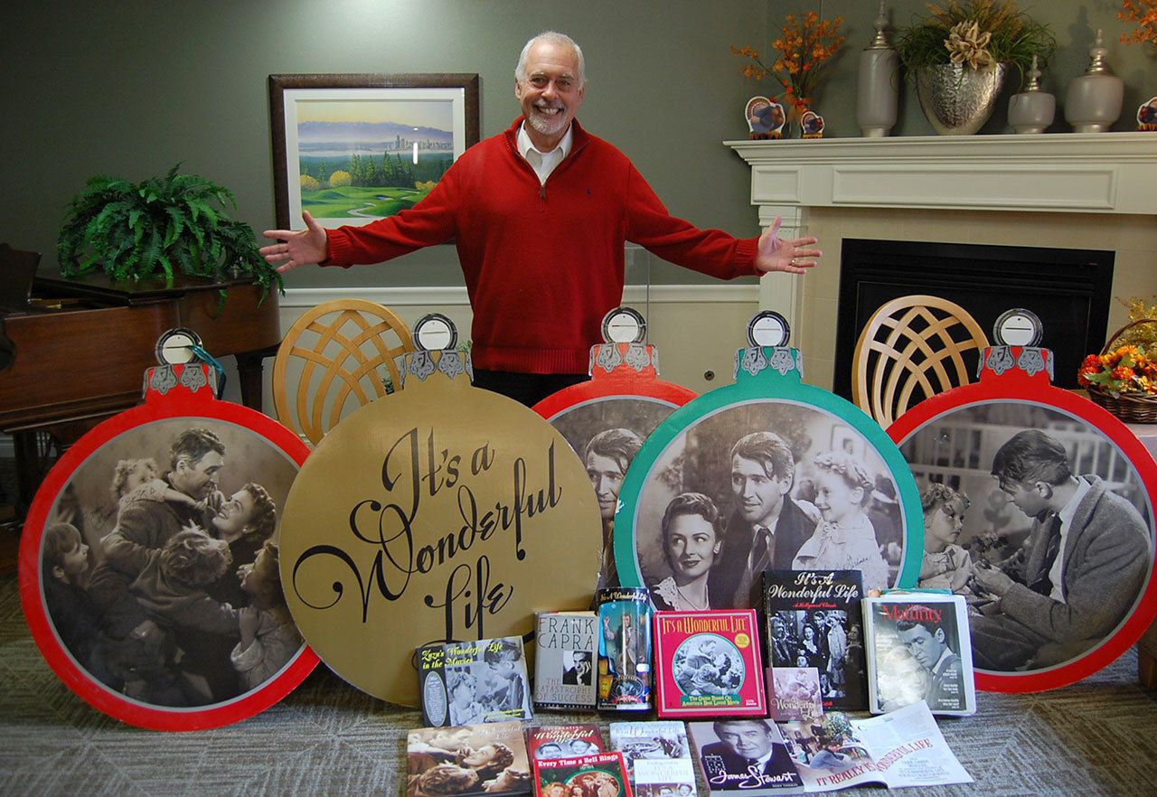 Covenant Shores Chaplain Greg Asimakoupoulos poses with some of his “It’s a Wonderful Life” memorabilia. Asimakoupoulos is speaking at the annual festival celebrating the movie in Seneca Falls, New York, this weekend. Katie Metzger/staff photo