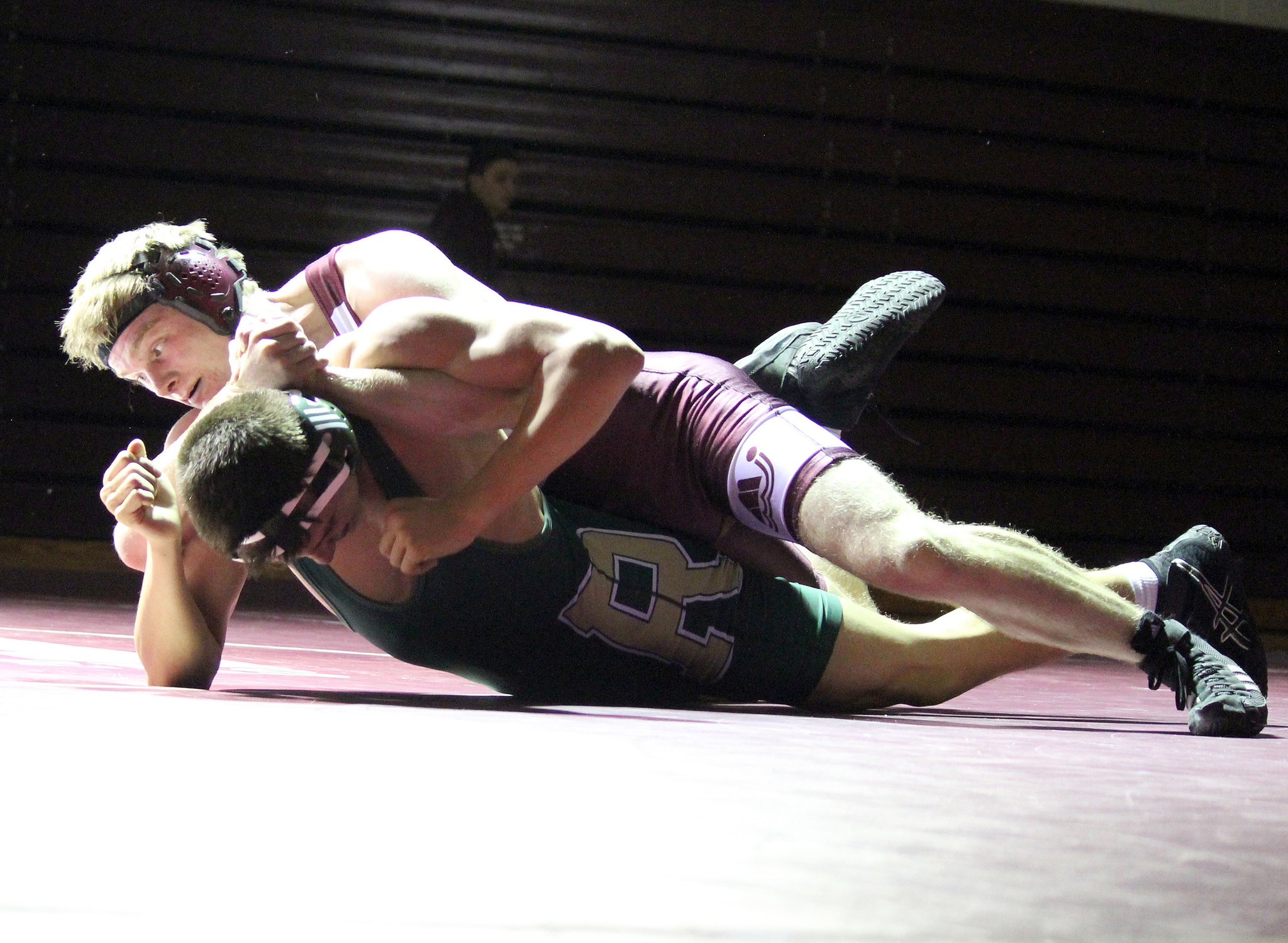 Photo courtesy of Jamie Childress                                Mercer Island Islanders grappler Finn Childress controls the action against Redmond’s Carson Lui in the 152-pound weight class.