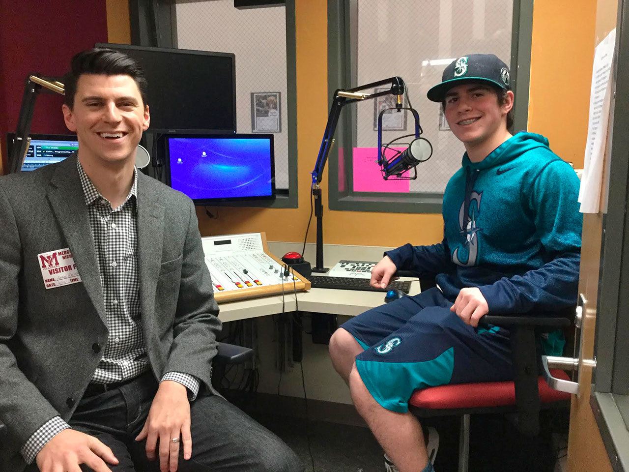 Seattle Mariners announcer Aaron Goldsmith, left, with MIHS student Max Tanzer. Photo courtesy of Craig Degginger/Mercer Island School District
