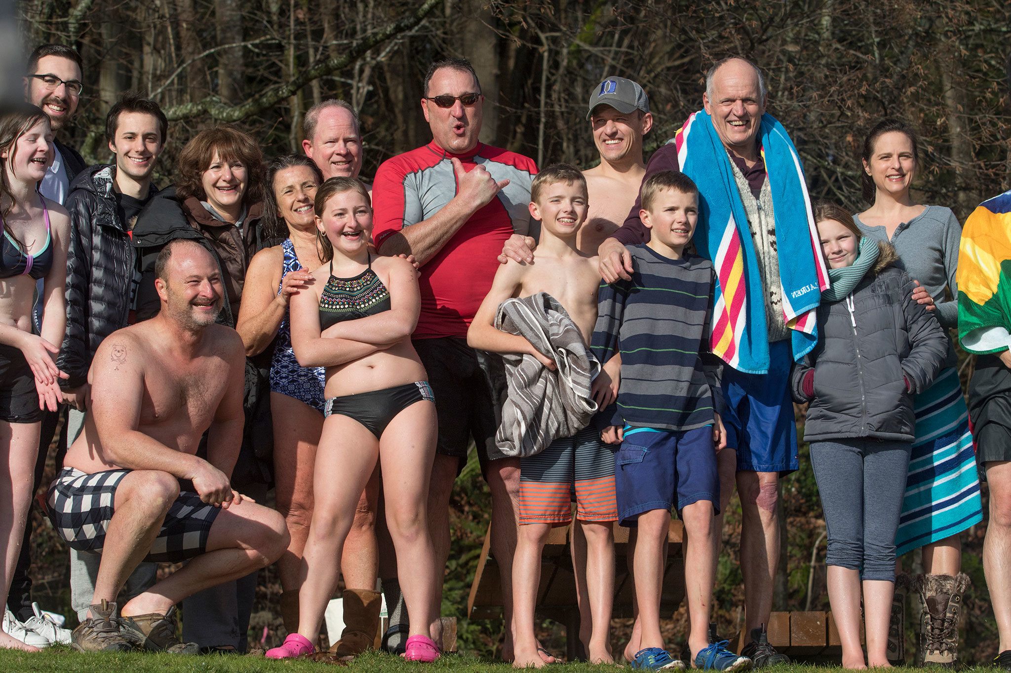 Nile Clarke, third from right, a longtime teacher and cross country coach on the Island, poses with fellow Polar Bear Plungers on New Year’s Day at Clarke Beach. It was Clarke’s 50th appearance at the plunge he began 50 years ago. Matt Brashears/Special to the Reporter
