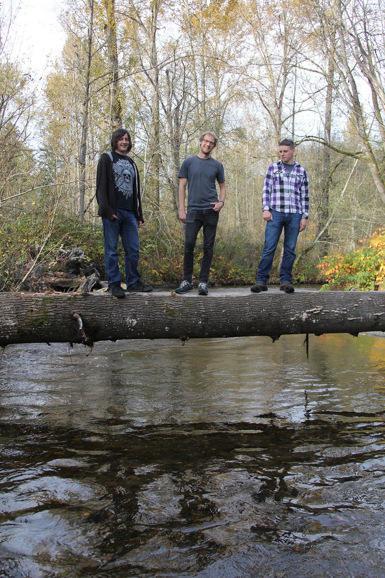 University of Washington Bothell biology majors (left to right) Jake Loew, Scott Miller and James Solberg survey Swamp Creek for any signs of Kokanee and to gather information for a restoration report. Photo courtesy of Celeste Gracey