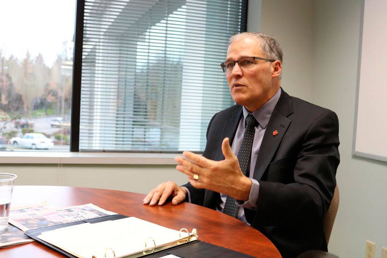 Gov. Jay Inslee speaks with Sound Publishing staff during a meeting on Jan. 20 at the Bellevue Reporter office. Matt Phelps/Kirkland Reporter