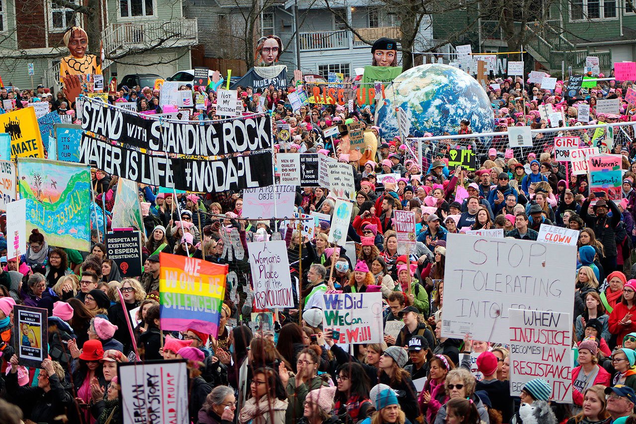 Marchers gather in Judkins Park to listen to speeches before marching to Seattle Center. Allison DeAngelis/Bellevue Reporter