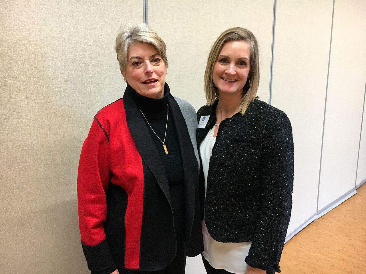 Terry Moreman and Laurie Givan smile at the Feb. 2 Mercer Island Chamber lunch, after Givan was announced as the organization’s new executive director. Katie Metzger/staff photo