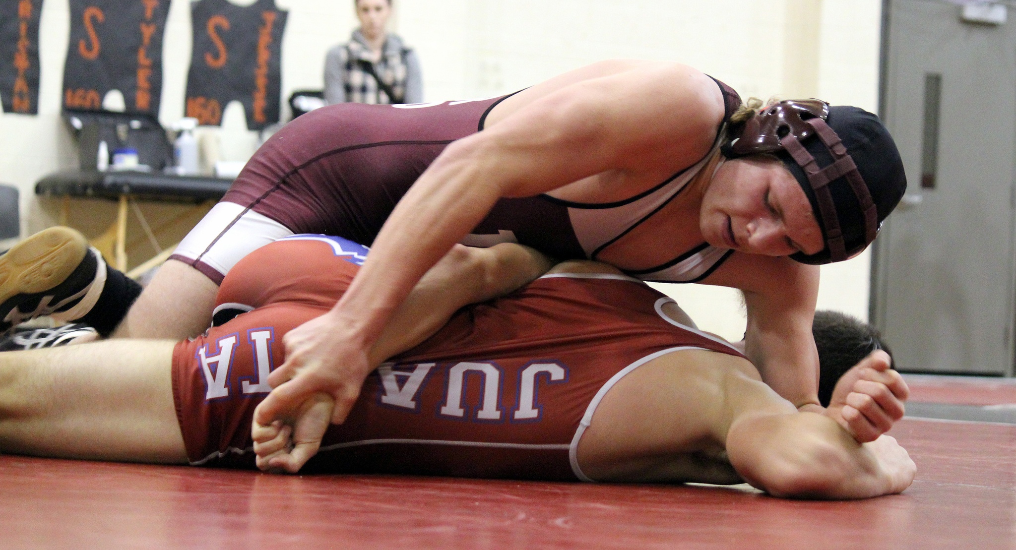 Photo courtesy of Jamie Childress                                Mercer Island Islanders wrestler Donnie Howard (top) gains the upper hand against Juanita’s Nate Martin on Jan. 26. Howard earned a 6-0 win against Martin.