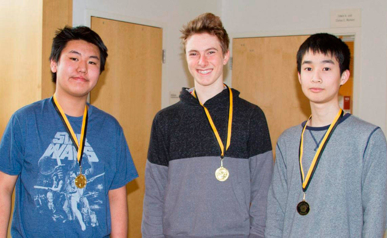 Allen Bi, Chris Elliott and Jason Zhang won the novice category at the seventh annual Pacific Lutheran University High School Programming Contest. Photo courtesy of Craig Degginger/Mercer Island School District