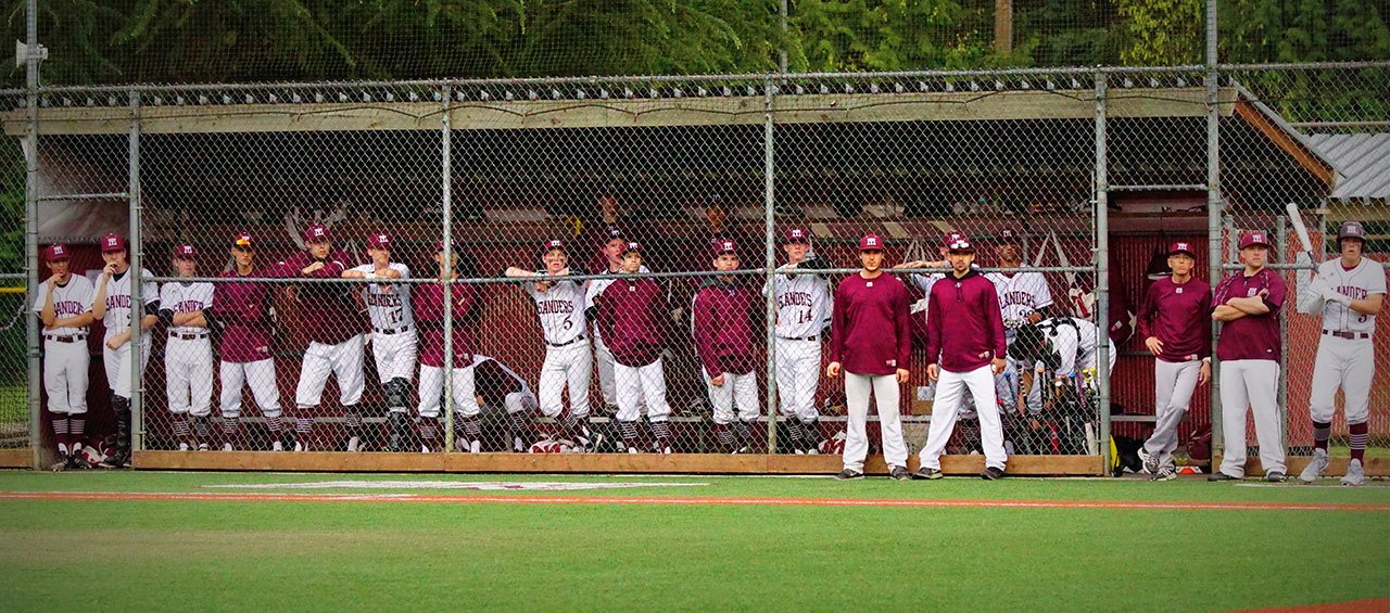 The Mercer Island baseball team looks on from the dugout during a game against Bellevue last April. Contributed photo