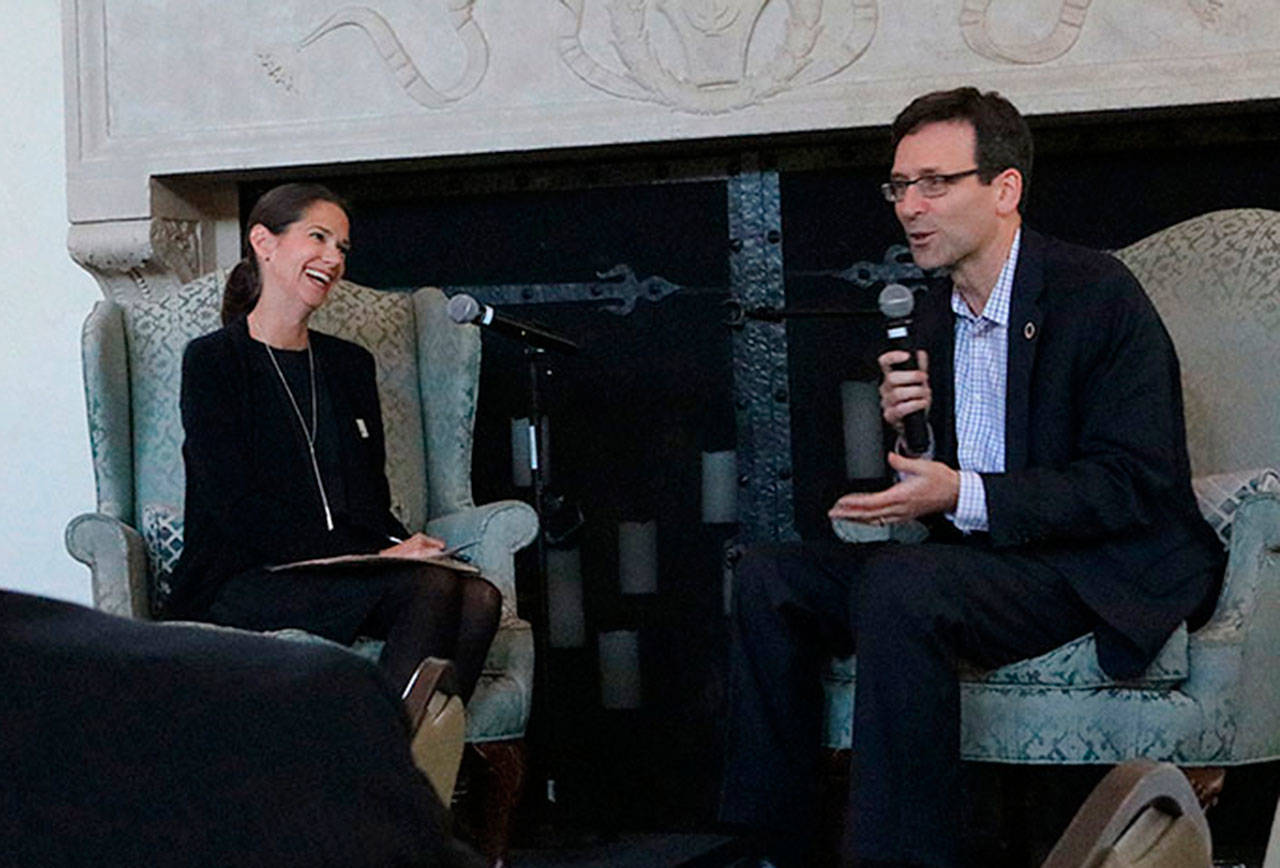Sound Cities Association Executive Director Deanna Dawson and Washington State Attorney General Bob Ferguson speak at a SCA dinner in Kenmore. Catherine Krummey/Bothell-Kenmore Reporter