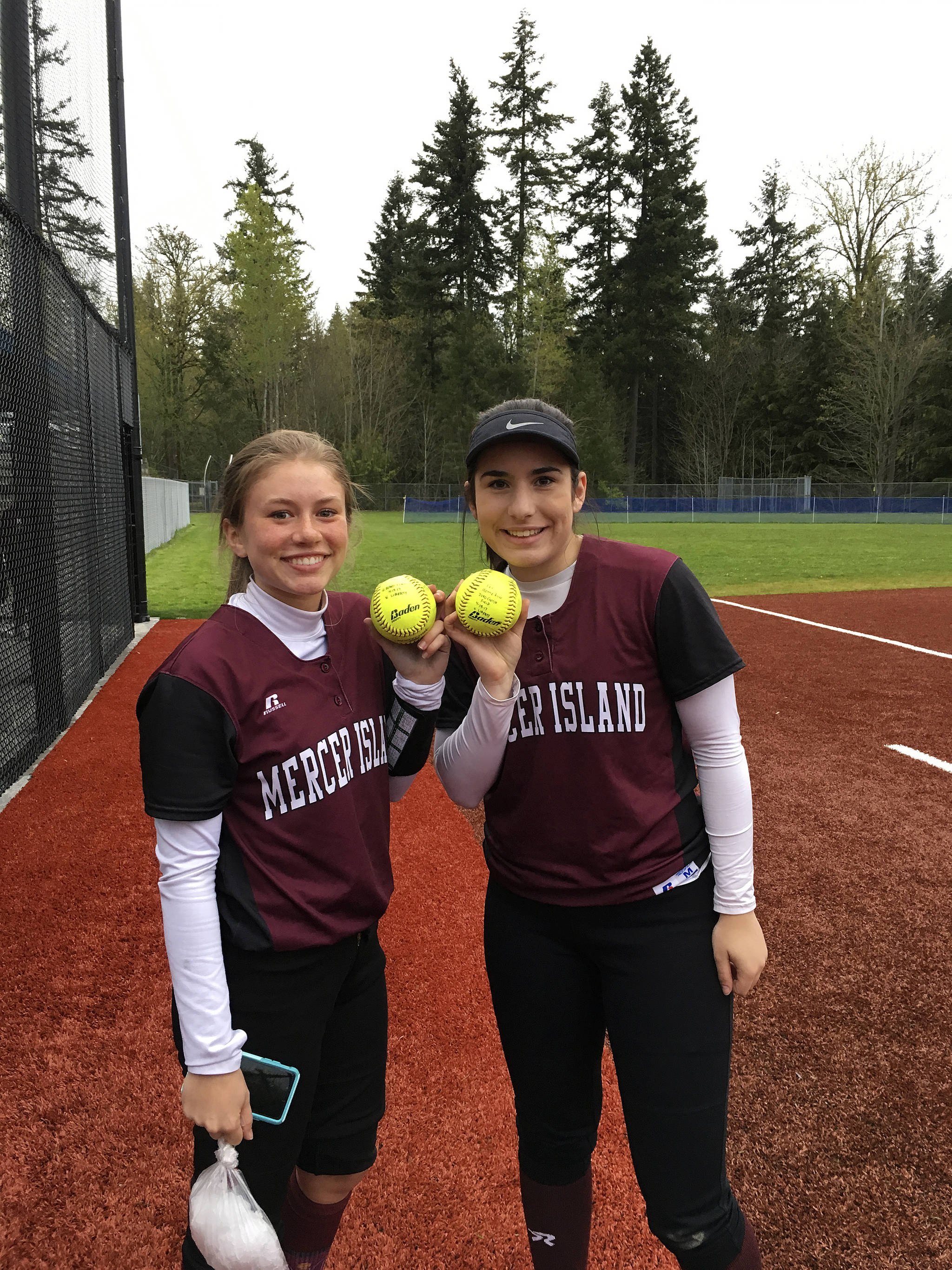 Photo courtesy of Carla Barokas                                Mercer Island softball players Olivia Kane, left, and Angelina Barokas, right, pose for a quick picture following Mercer Island’s 18-15 win against the Liberty Patriots on April 19. Kane connected on a grand-slam in the top of the fifth inning and Barokas had a home-run in the top of the sixth inning.