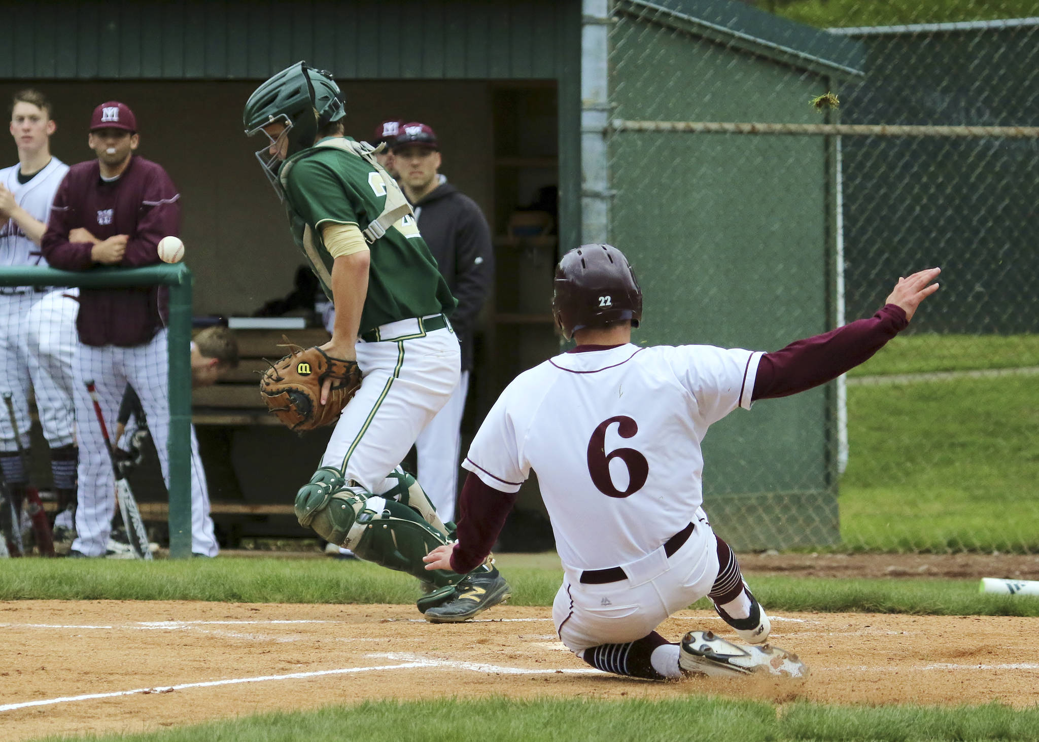 Photo courtesy of Jim Nicholson                                Mercer Island player Greg Fuchs scores the first run of the game for the Islanders in the bottom of the first inning. Mercer Island cruised to a 11-1 win in just five innings against the Redmond Mustangs on April 26 at Courter Field at Bellevue College.