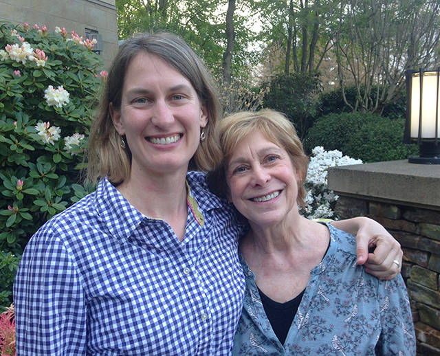 Incoming Farmers Market Manager Lora Liegel smiles with outgoing manager Patty Spahr. Photos courtesy of Lora Liegel