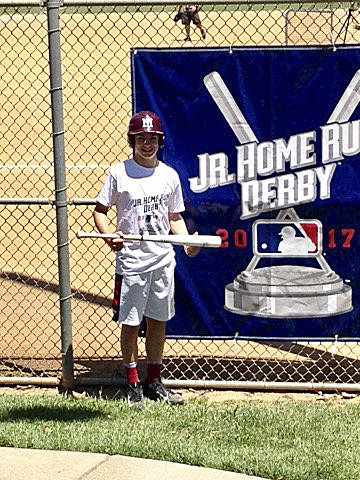 Photo courtesy of Kym Otte                                Islander Middle School 12-year-old student Jakob Schulz won the Regional Junior Homerun Derby Championship on May 21 in Los Angeles. Schulz, who competed in the 12U division, competed against 40 athletes from Washington, Oregon, Montana and California. Schulz hit five home runs in the first round, advancing to regional final (which consisted of four competitors). Schulz connected on seven home runs in the next round on just 20 pitches, earning the championship. Schulz will compete in the National Junior Home Run Derby competition during the Major League Baseball All-Star week in July in Miami.