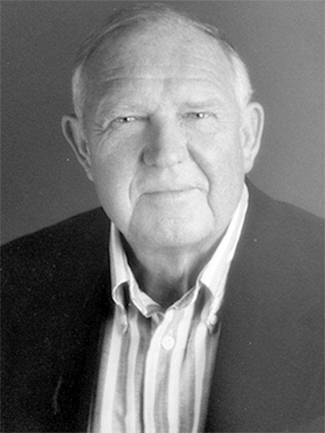 ROBERT E. CARLSON