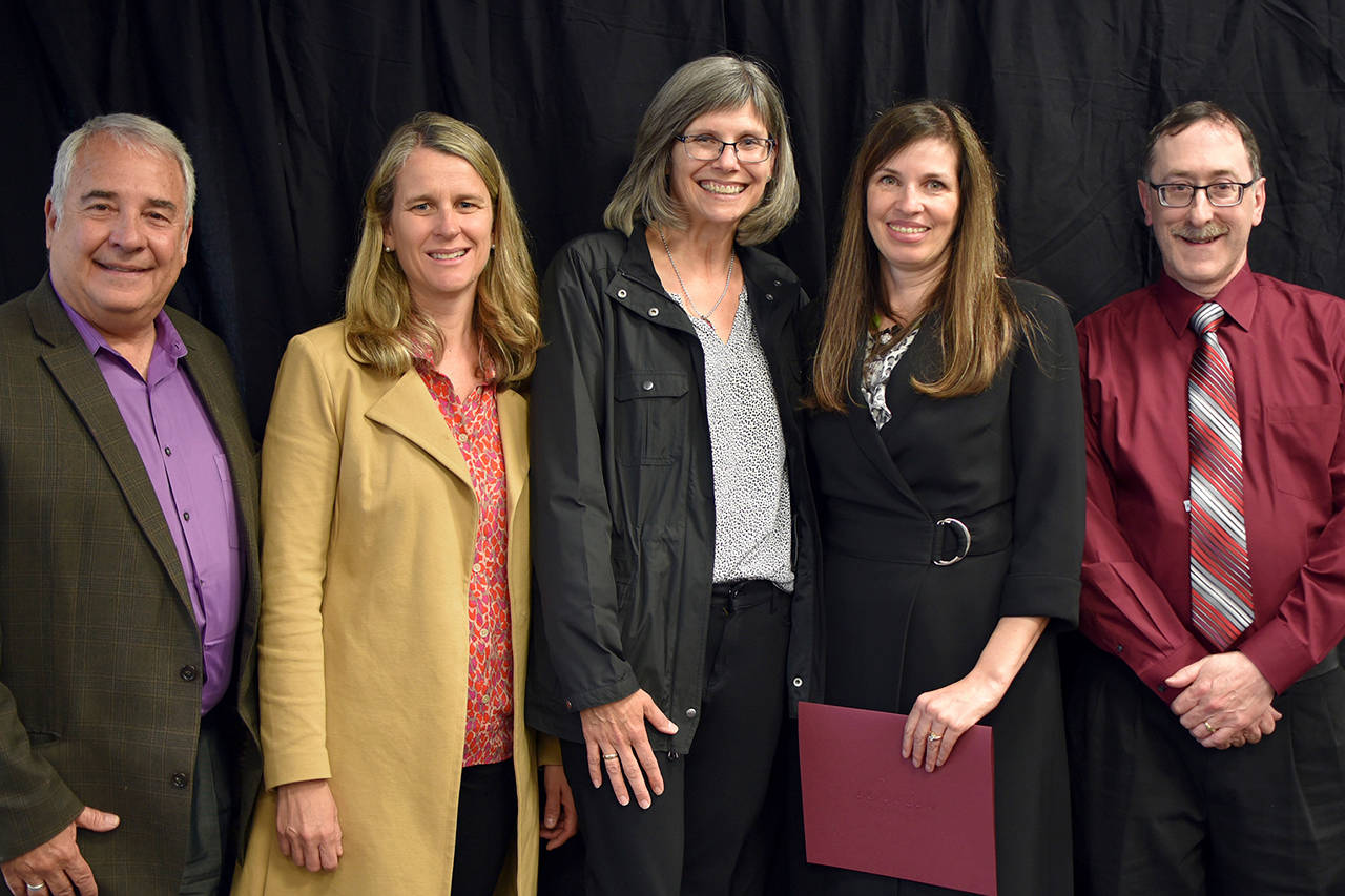 Superintendent Dr. Gary Plano, Jocelyn Barber, Kathy Middleton, Debbie Hanson and Communications Coordinator Craig Degginger pose at a meeting on May 12. Photo courtesy of Craig Degginger/Mercer Island School District