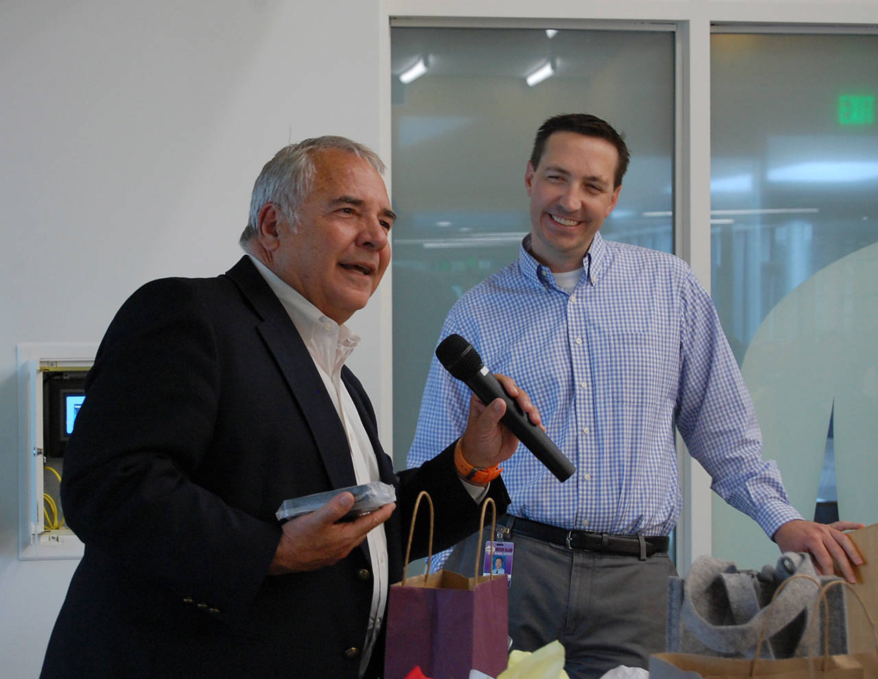 Mercer Island School District Superintendent Dr. Gary Plano speaks at his retirement celebration on June 15, after opening gifts from his colleagues. Plano has served as superintendent for 10 years, and will retire on June 30. Katie Metzger/staff photo