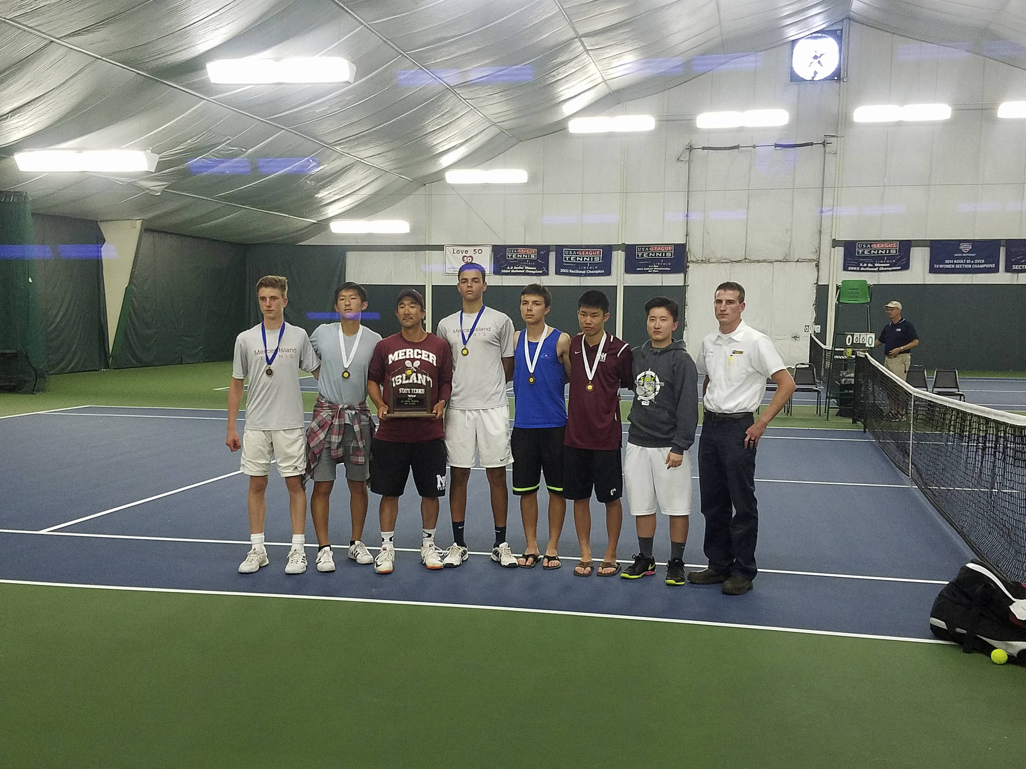 Photo courtesy of Mark Anderson                                The Mercer Island Islanders boys tennis team captured the Class 3A state team championship on May 27 in the Tri-Cities, compiling a total of 22 team points. Lakeside finished in second place with 20 points.The Mercer Island doubles team consisting of Christian Anderson and Chris Elliot won the Class 3A doubles state championship. The Islanders doubles duo of Jonah Tang and Kevin Chen earned fifth place in the Class 3A doubles tournament. Islanders’ singles player Zach Chew nabbed eighth place in the Class 3A singles tournament.