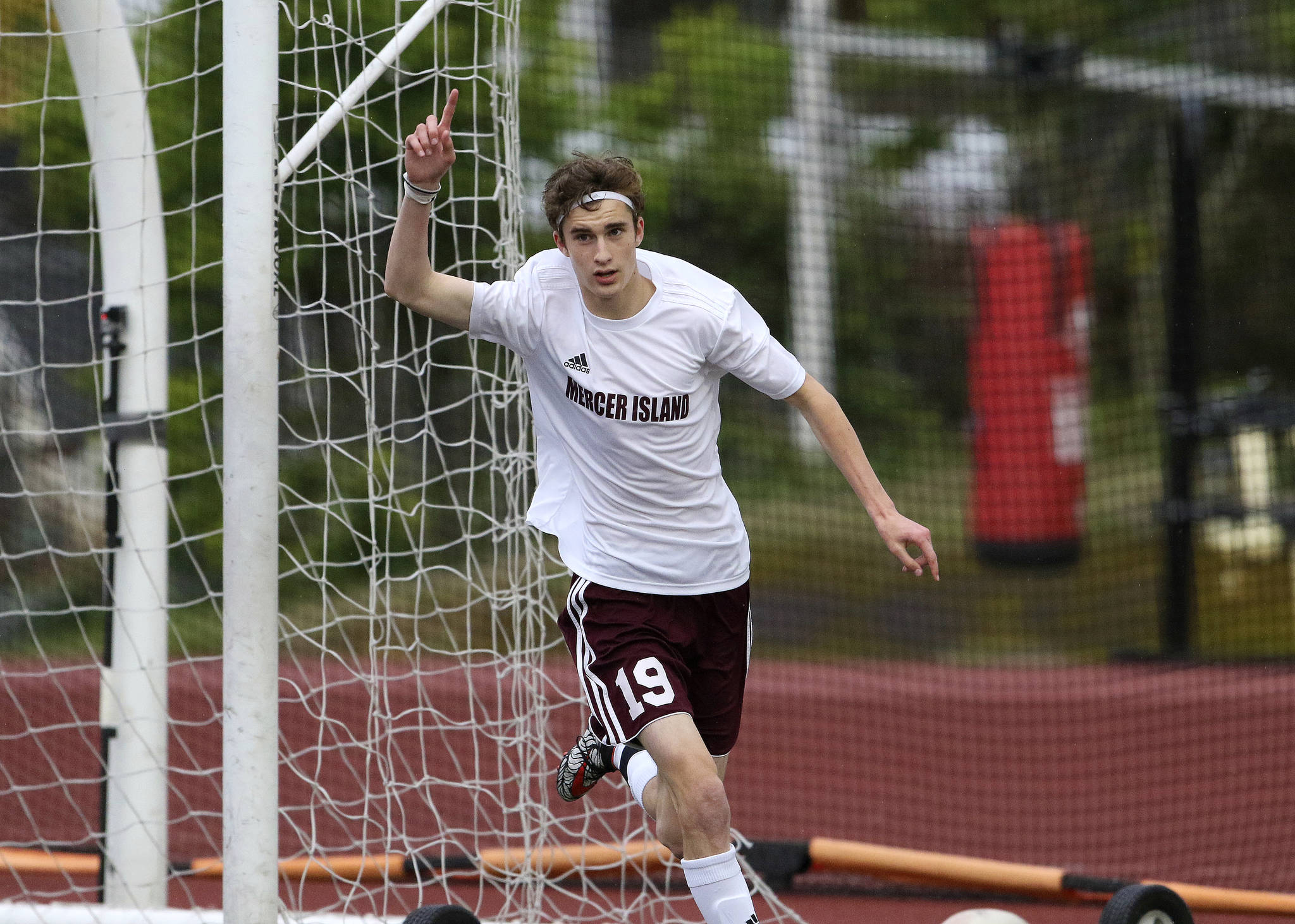 Photo courtesy of Jim Nicholson                                Mercer Island Islanders 2017 graduate Lucas Meek celebrated with his No. 1 sign in the air after scoring a goal against the Shorecrest Scots in the first round of the Class 3A state playoffs on May 16. The Islanders cruised to a 5-0 win.