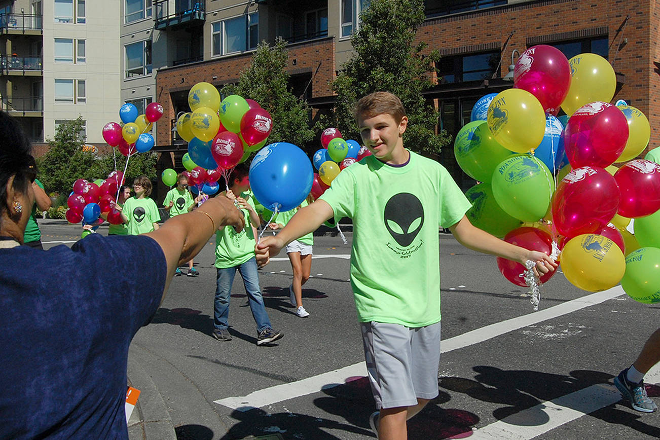 Islanders parade into Summer Celebration