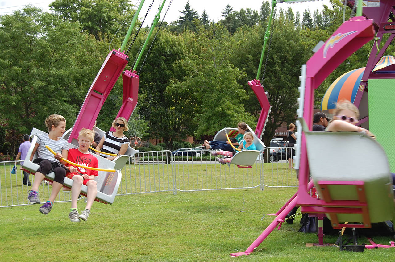 Islanders enjoy the children’s fun zone at last year’s Summer Celebration. This year’s festival will be held on July 8-9. Katie Metzger/file photo