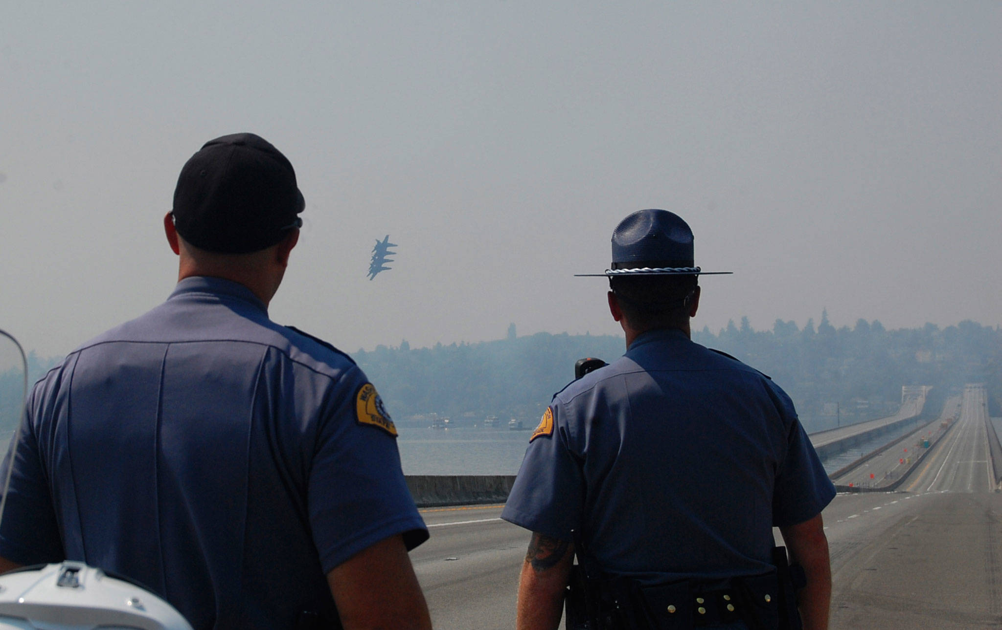 State troopers watch the Blue Angels fly over I-90 during Seafair on Aug. 4. Katie Metzger/staff photo