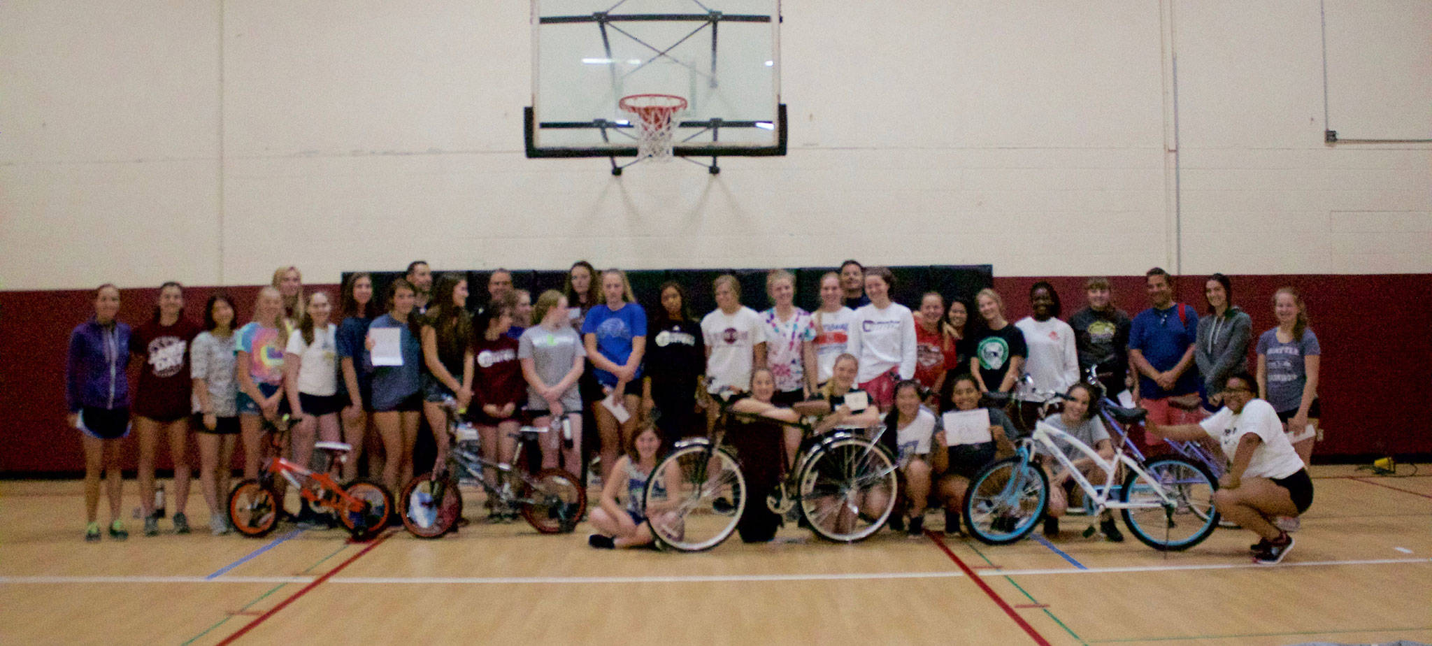 MIHS girls’ volleyball team bonds by building bikes