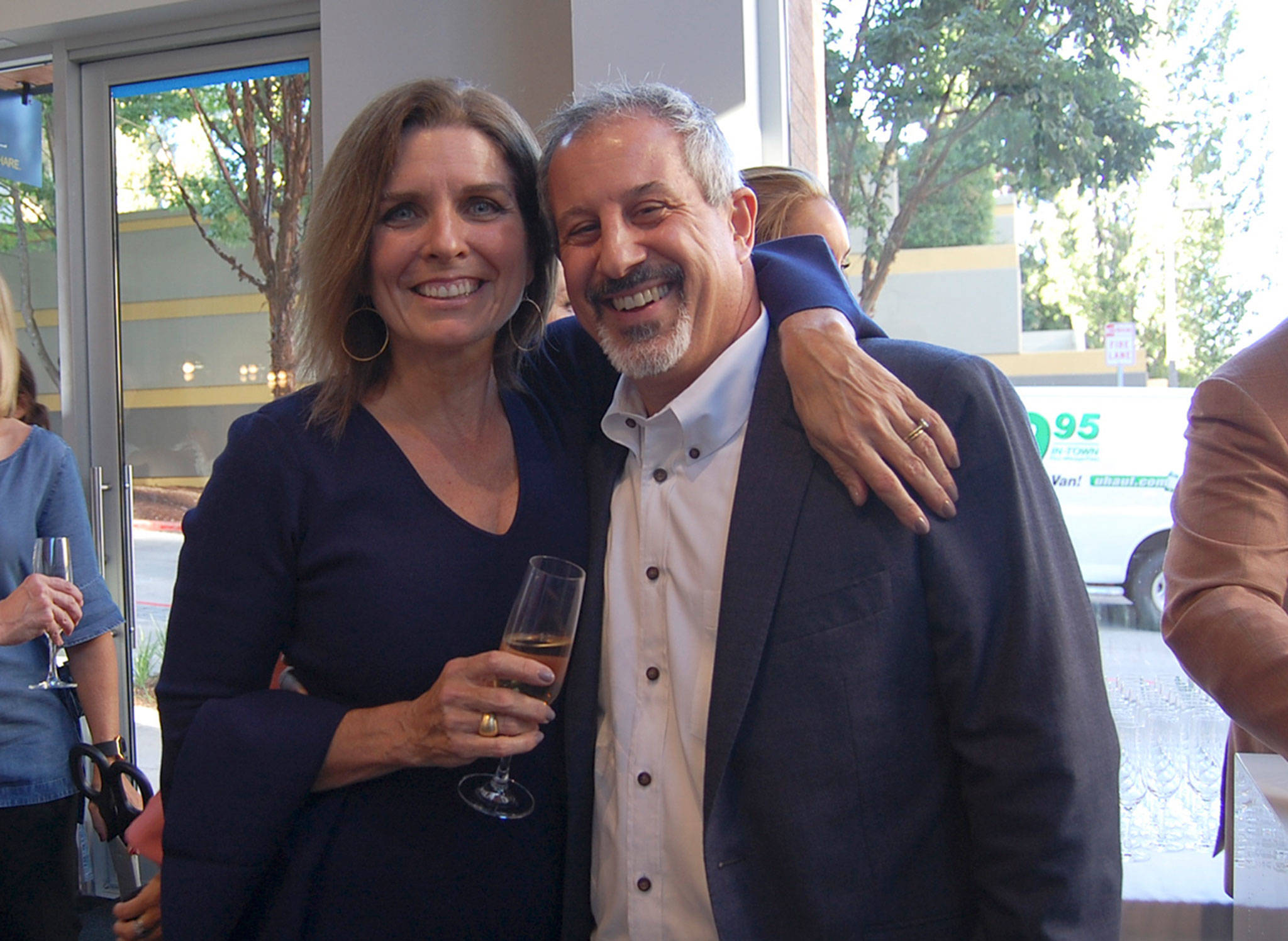 Lisa and Rino Caruccio pose before the ribbon cutting. Katie Metzger/staff photo