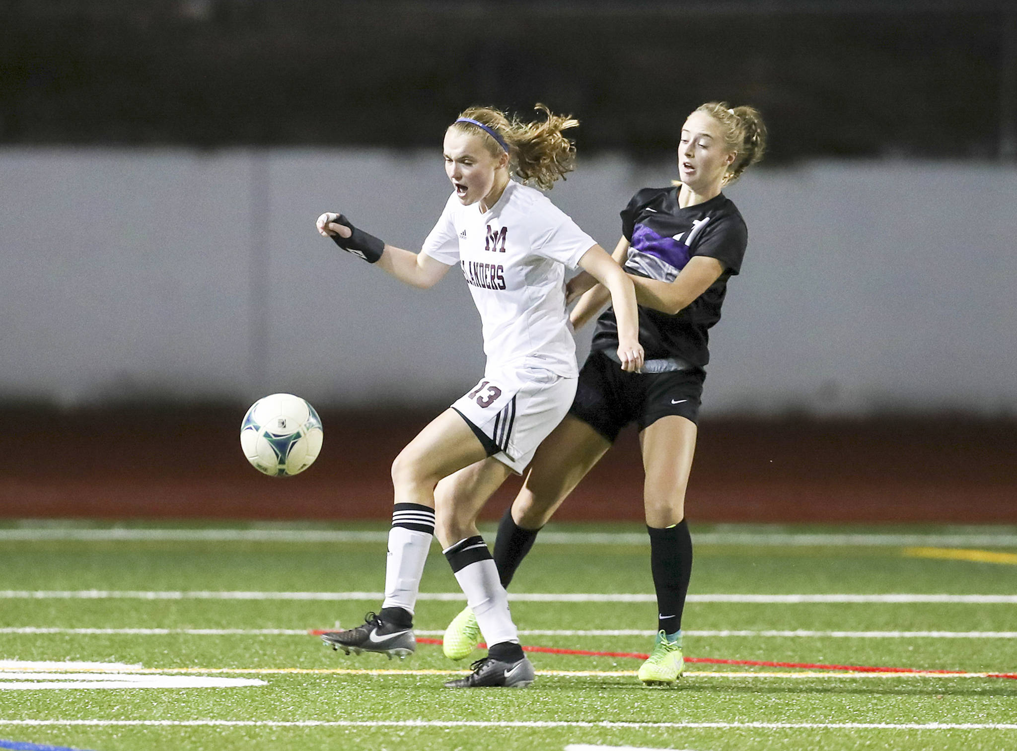 Photo courtesy of Rick Edelman/Rick Edelman Photography                                Mercer Island senior midfielder Kendall Riley controls the ball against the Lake Washington Kangaroos. Riley scored a goal on a penalty kick in the 79th minute of play. Mercer Island defeated Lake Washington 5-1.                                 Photo courtesy of Rick Edelman/Rick Edelman Photography                                Mercer Island senior midfielder Kendall Riley controls the ball against the Lake Washington Kangaroos. Riley scored a goal on a penalty kick in the 79th minute of play. Mercer Island defeated Lake Washington 5-1.