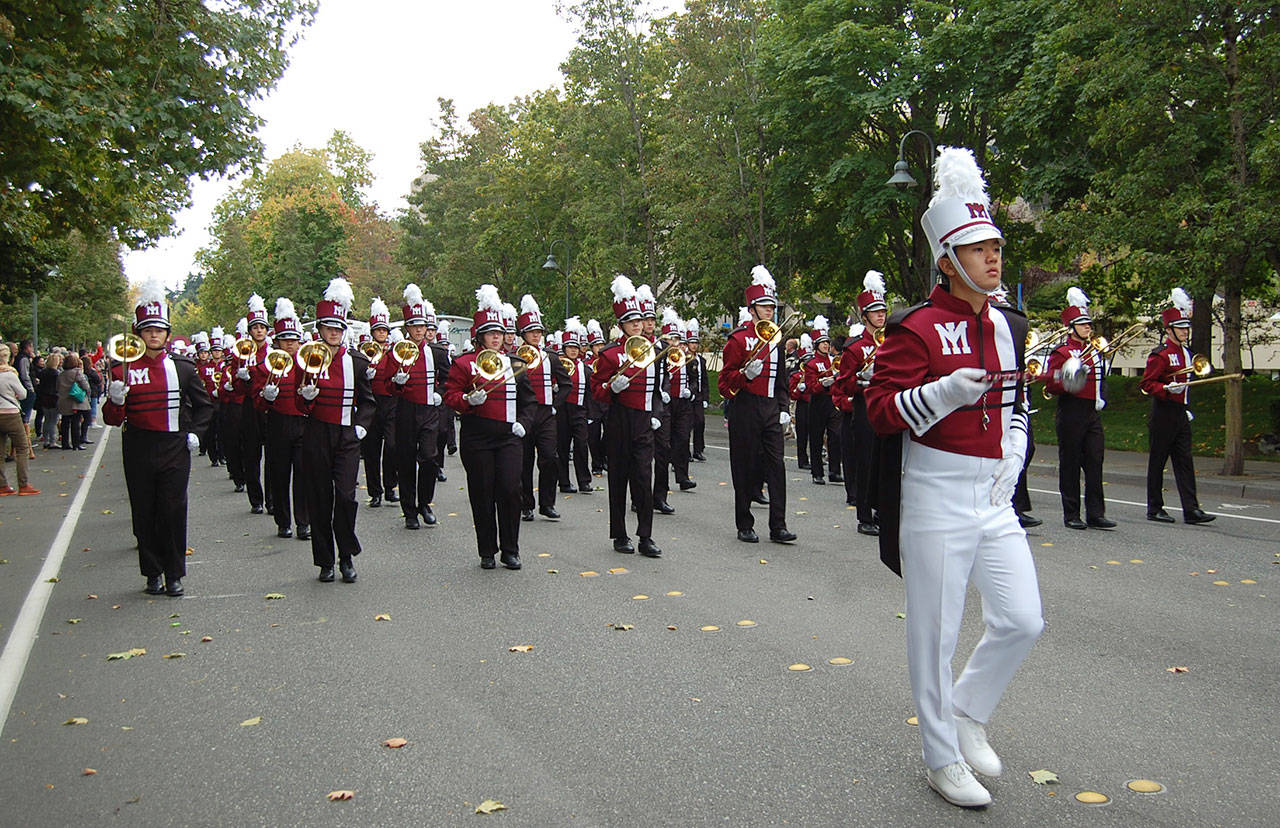 The MIHS Marching Band entertains the crowd along 77th Avenue Southeast during the Homecoming Parade on Oct. 6. Katie Metzger/staff photo