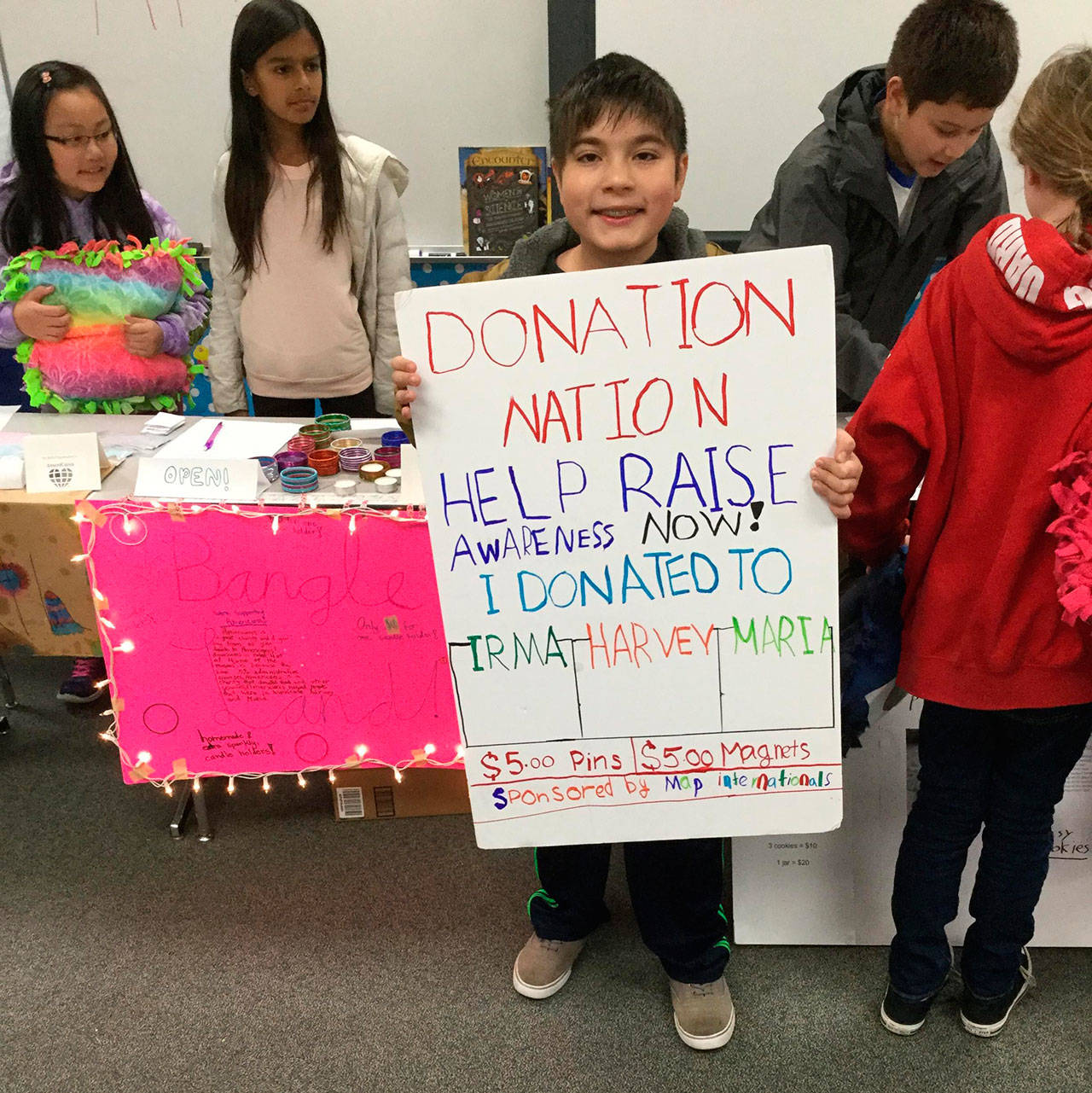 West Mercer students raise funds for the relief efforts of Hurricanes Harvey, Irma and Maria. Photo courtesy of Craig Degginger/Mercer Island School District
