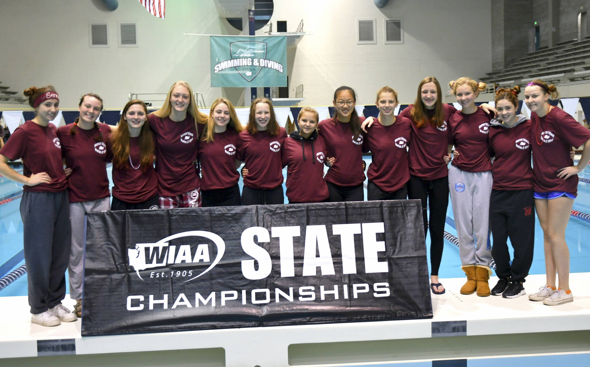 Photo courtesy of Allison Nelson                                The Mercer Island Islanders girls swim squad registered a fourth place finish at the Class 3A state swim meet on Nov. 11 at the King County Aquatic Center in Federal Way. The Islanders compiled 180 team points. Mercer Island junior Annie Pearse earned second place in the 50 free with a time of 24.36 and captured seventh place in the 100 free clocking a time of 53.83. Alexa Williams finished in 11th place in the 100 backstroke with a time of 1:00.55. Kai Williamson captured fourth place in the 100 backstroke with a time of 59.15. Islanders’ junior Sophia McGuffin earned fifth place in the 1-meter dive. Hailey Vandenbosch finished in 10th place in the 100 fly with a time of 59.85. Elizabeth Bailey earned 12th place in the 50-free with a time of 25.04 and 13th place in the 100 free with a time of 54.51. Chloe Mark took sixth place in the 500 free with a time of 5:13.5. Ellie Williams finished in ninth place in the 500 free with a time of 5:17.01.                                RELAYS                                The 200 medley relay team of Kaitlyn Williamson, Grace Olsen, Hailey Vandenbosch and Ellie Williams captured sixth place with a time of 1:52.44. The 200 free relay squad consisting of Annie Pearse, Julia Williamson, Elizabeth Bailey and Ellie Williams earned seventh place with a time of 1:40.35. The 400 free relay team of Annie Pearse, Hailey Vandenbosch, Elizabeth Bailey and Julia Williamson nabbed a fifth place finish with a time of 3:37.76.