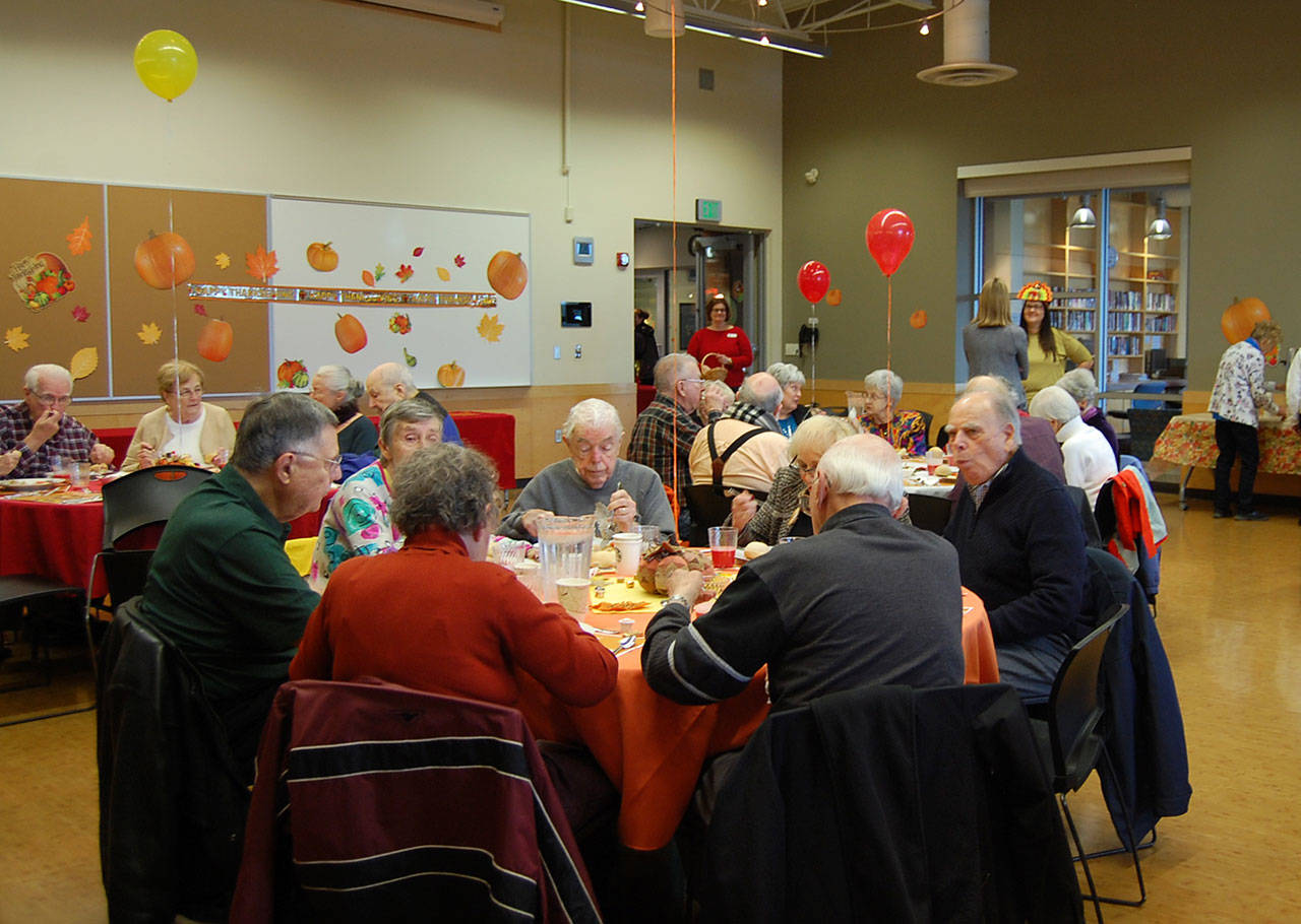 Seniors enjoy a Thanksgiving meal for $5.50 at the Mercer Island Community and Event Center on Nov. 16. Katie Metzger/staff photo