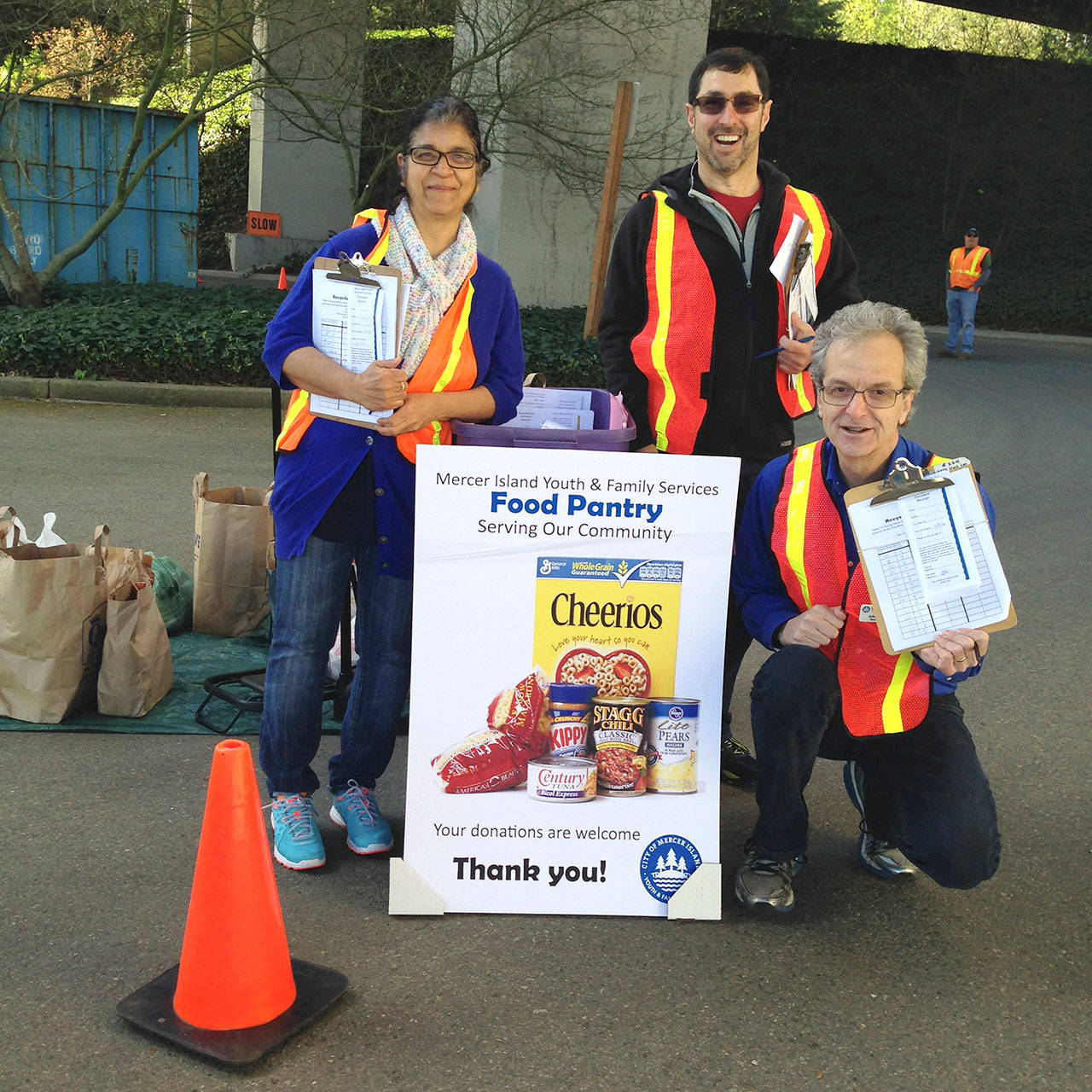 Volunteers for Mercer Island Youth and Family Services do a donation drive for the food pantry, which is visited close to 1,500 times each year. Courtesy photo